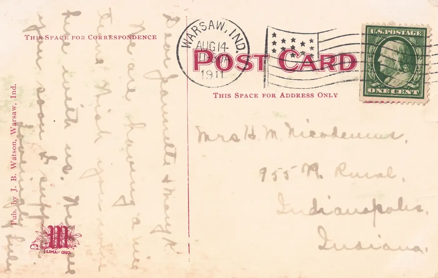 The address side of the moonlight postcard, with a faint pencil message from Lulu, a green one-cent Franklin stamp, and a Warsaw, Indiana postmark dated August 14, 1911